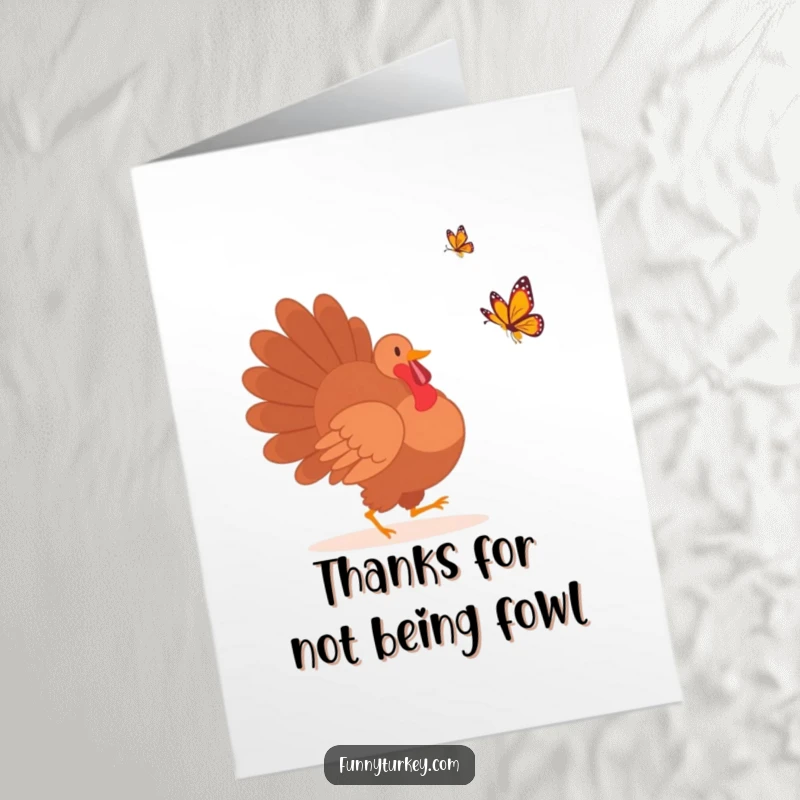 Funny Free Printable Thank You Card: Silhouette turkey humorously chasing a butterfly, expressing thanks with a playful spirit.