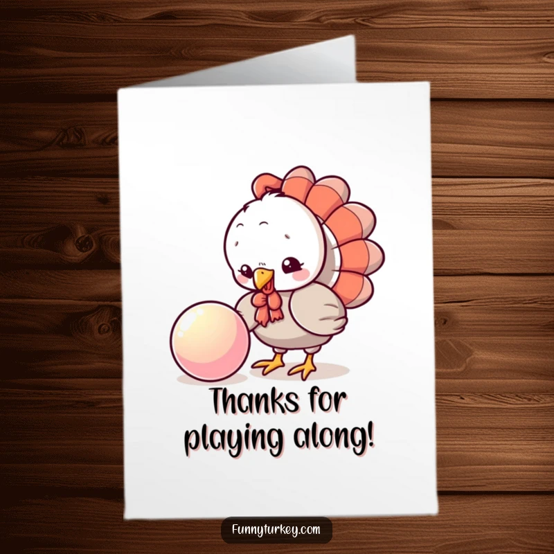 Funny Free Printable Turkey Thank You Card pecking curiously at a shiny bouncing ball, a cute thank you.